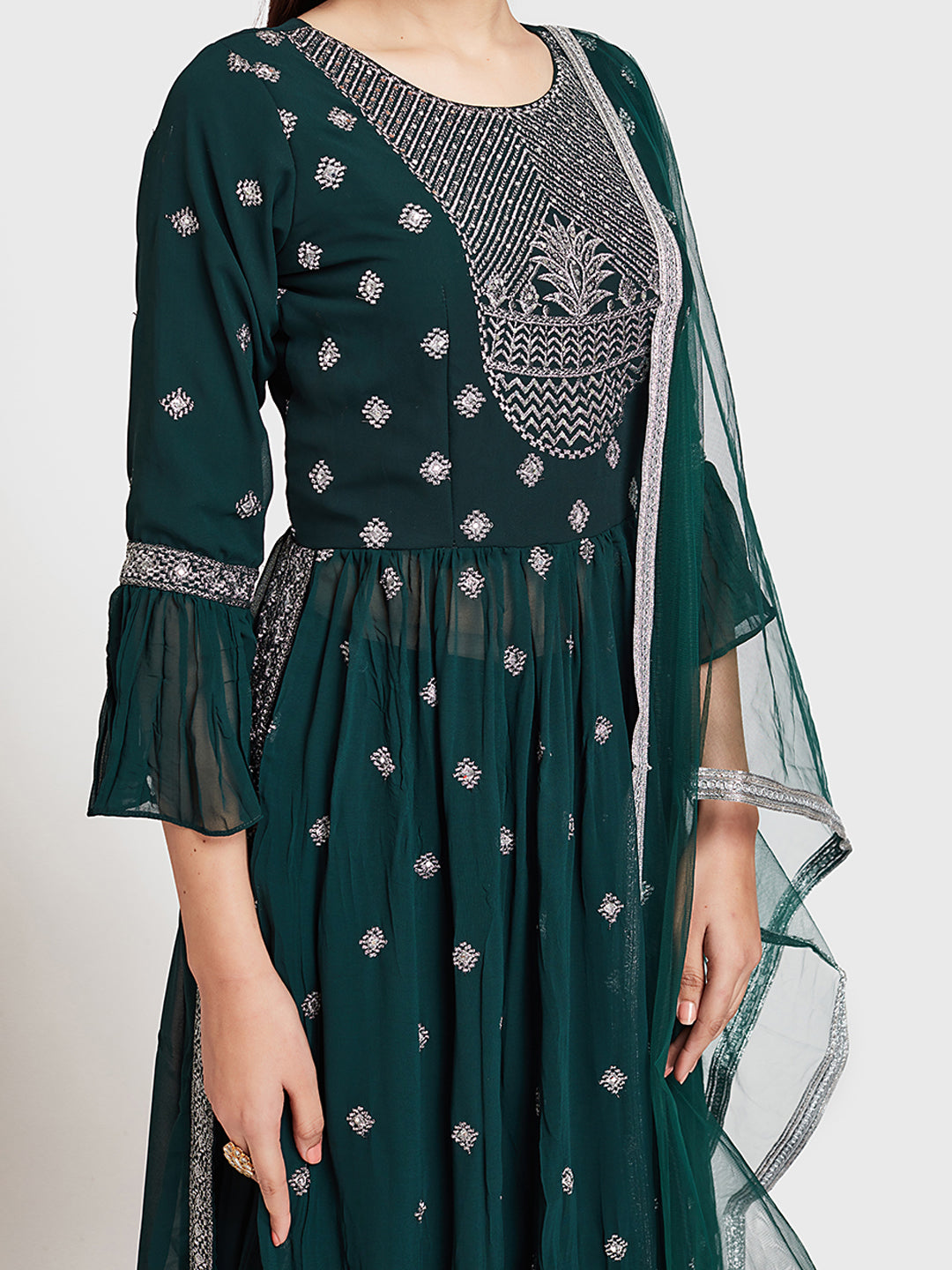 Neerus Green embroidered kurta set with skirt and dupatta - side view
