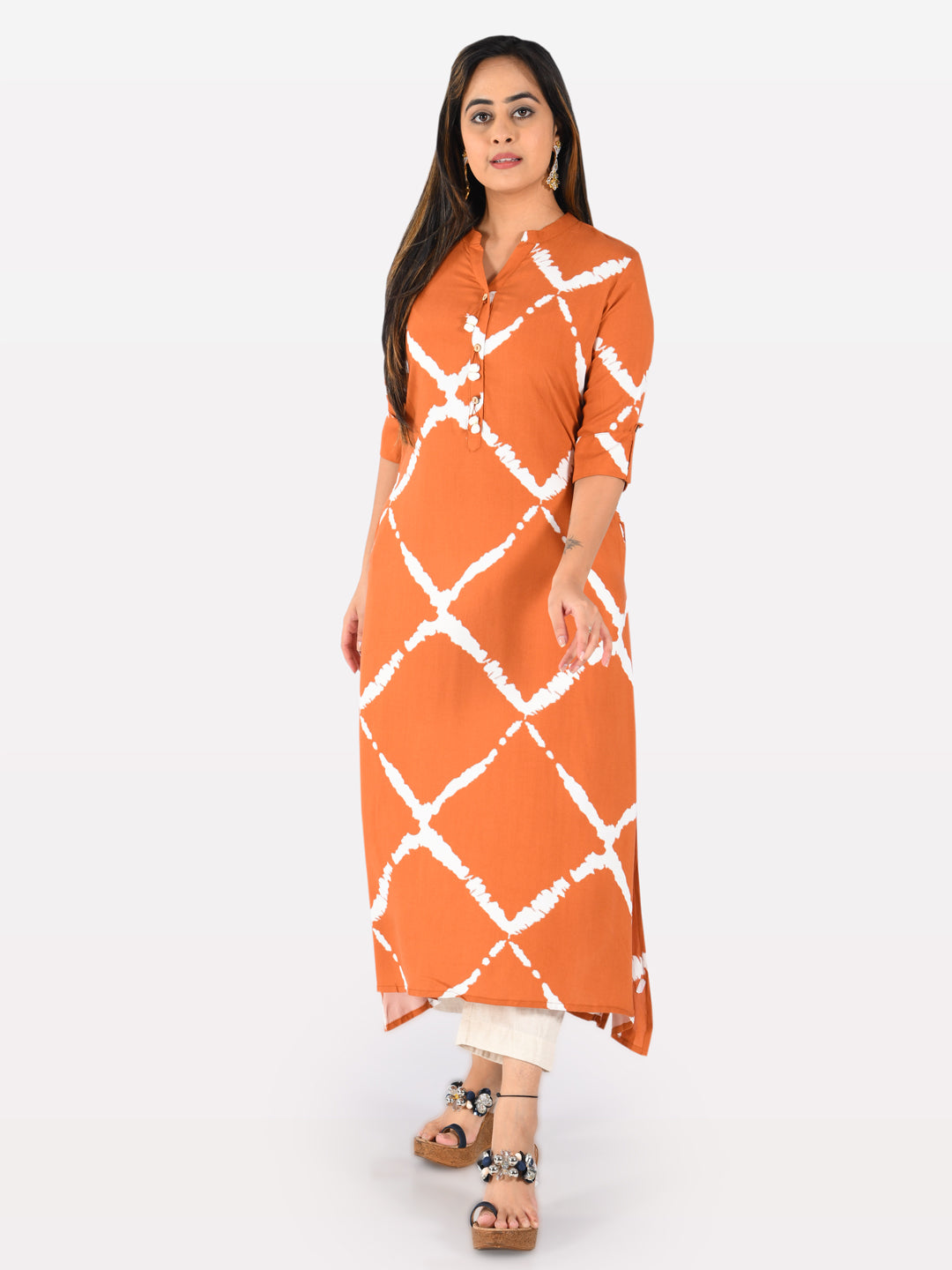 Neerus Orange rayon solid kurti - front view