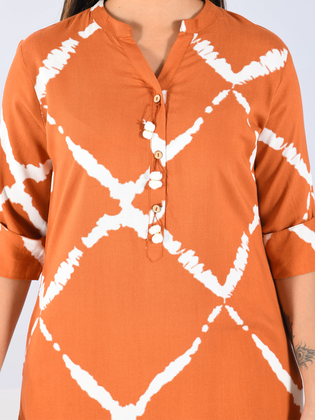 Neerus Orange rayon solid kurti - back view