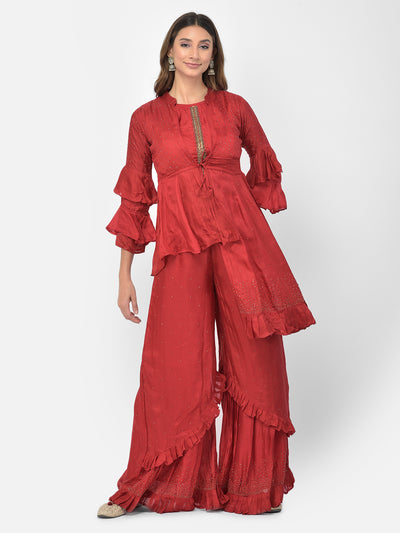 Neeru's maroon color silk fabric salwar kameez