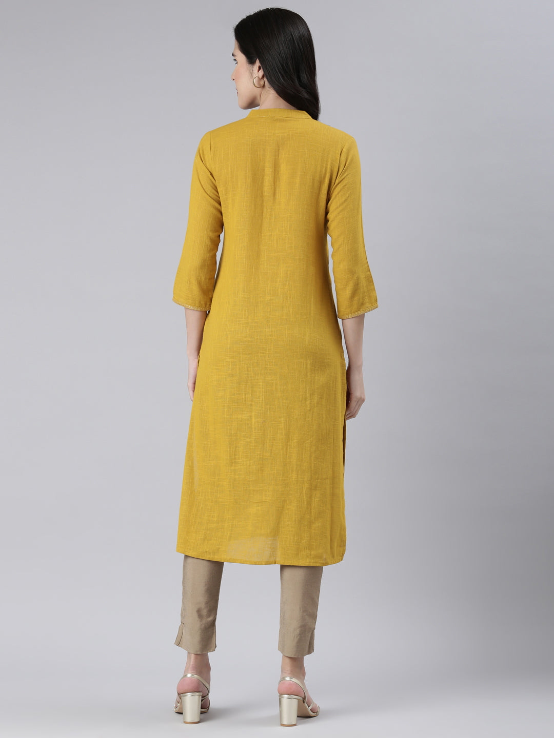 Neerus Yellow cotton solid straight kurta - side view