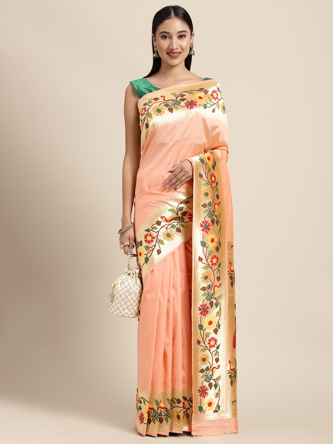 Neeru's peach color, banaras fabric saree