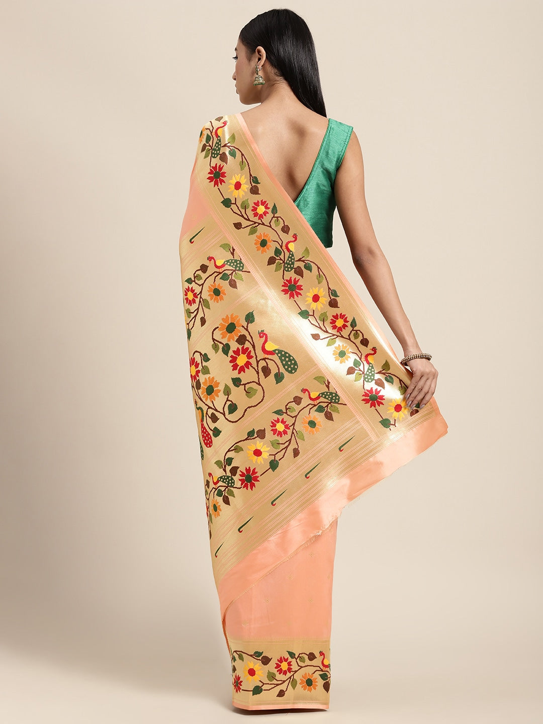 Neeru's peach color, banaras fabric saree