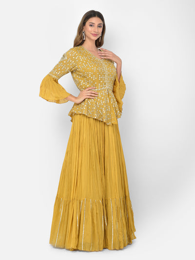 Neeru's mustard color crepe fabric salwar kameez