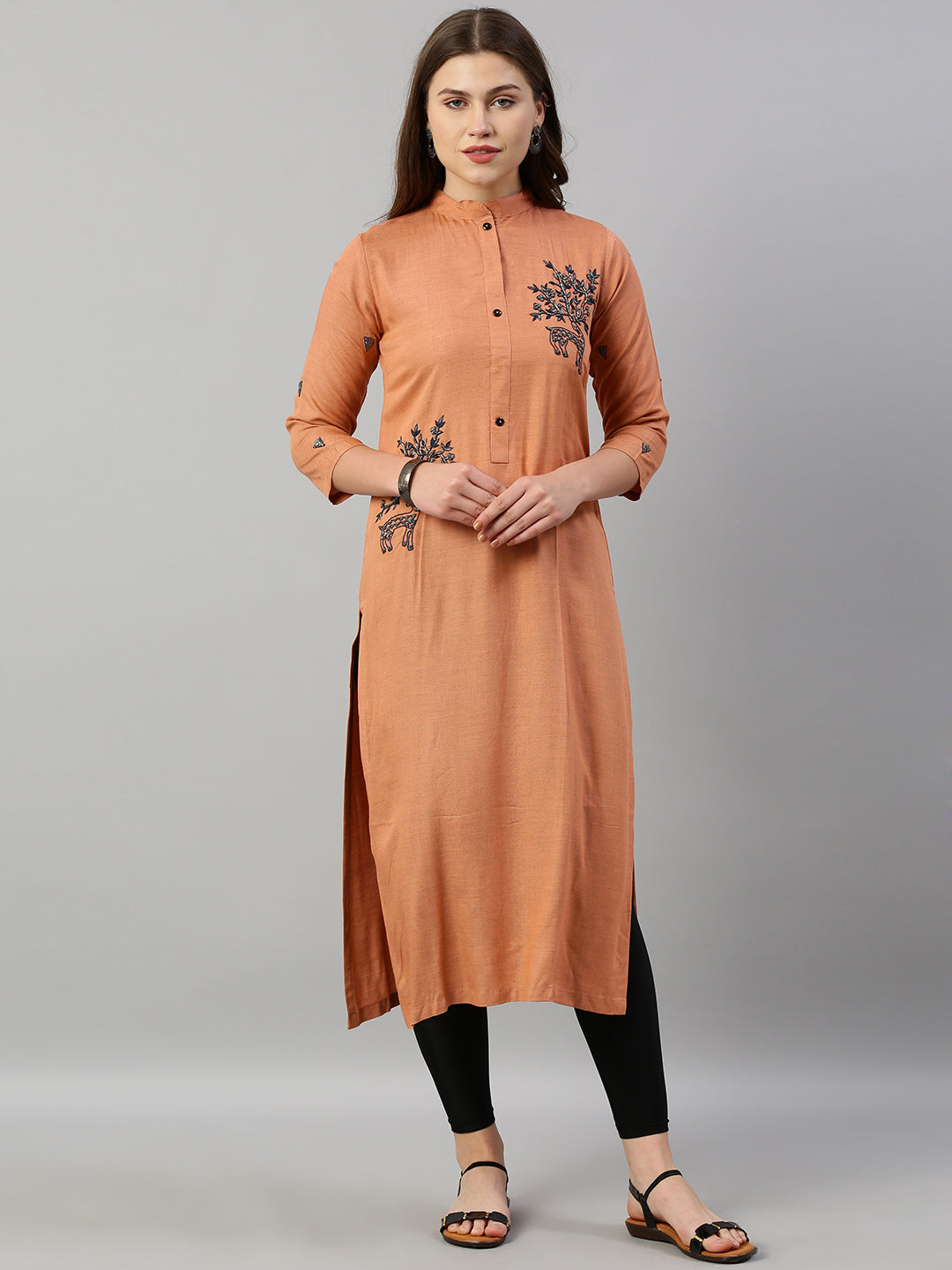 Neerus Orange rayon embroidered straight kurti - front view