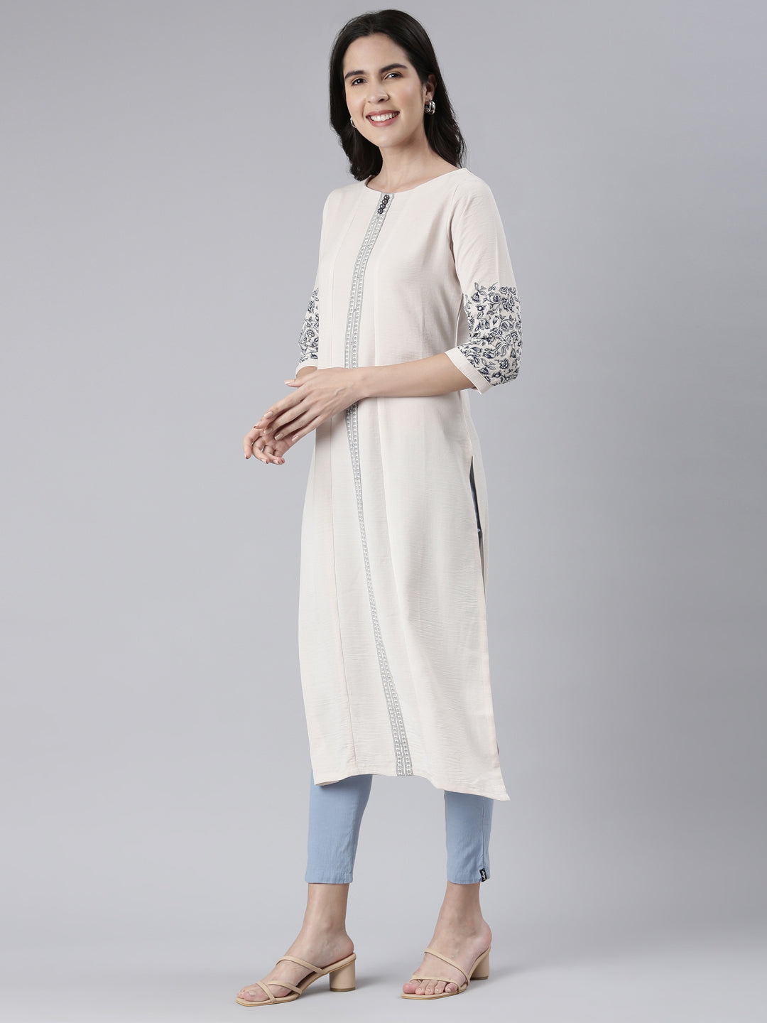 Neerus Beige cotton solid straight kurti - back view