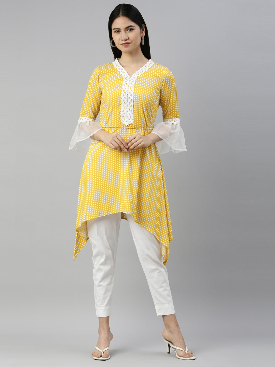Neerus Yellow viscose rayon printed A-line kurti - front view