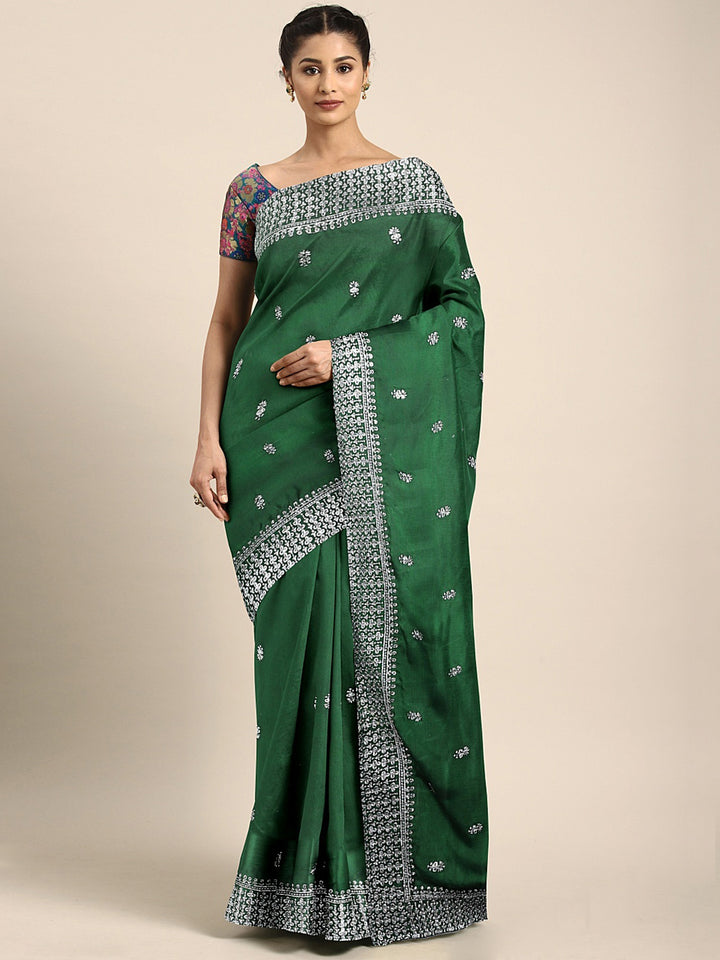 Neerus Green crepe woven zari saree - front view