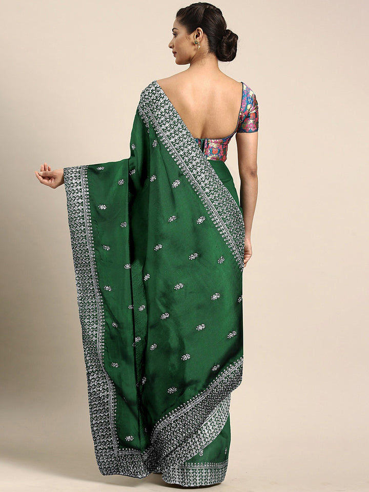 Neerus Green crepe woven zari saree - back view