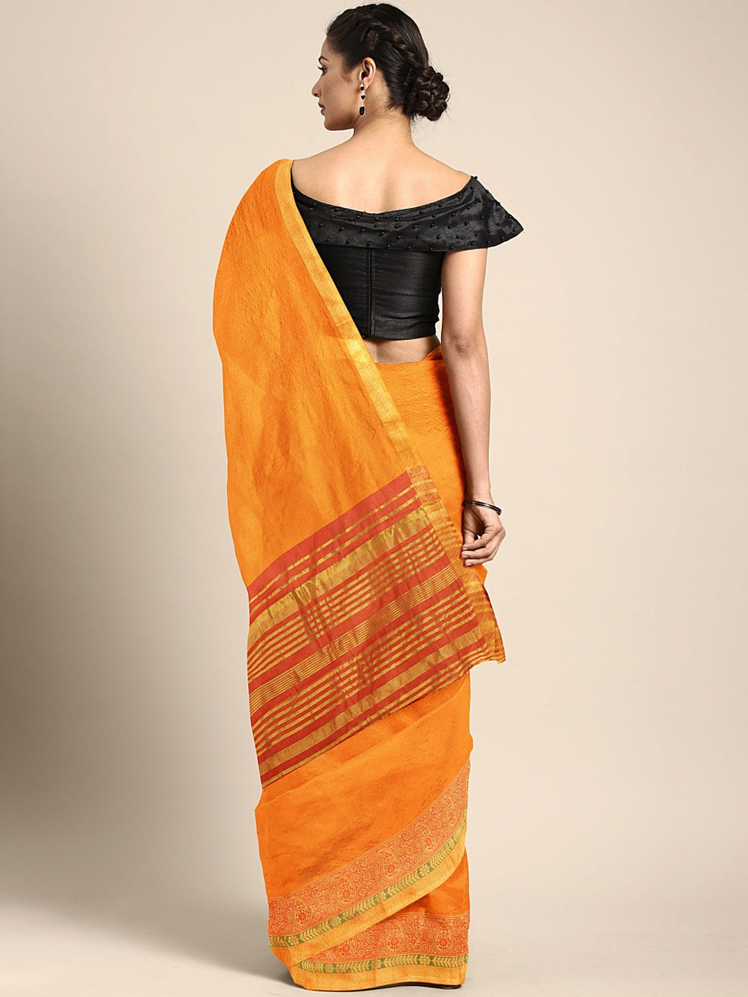 Neeru's Amber Textured Saree With Blouse