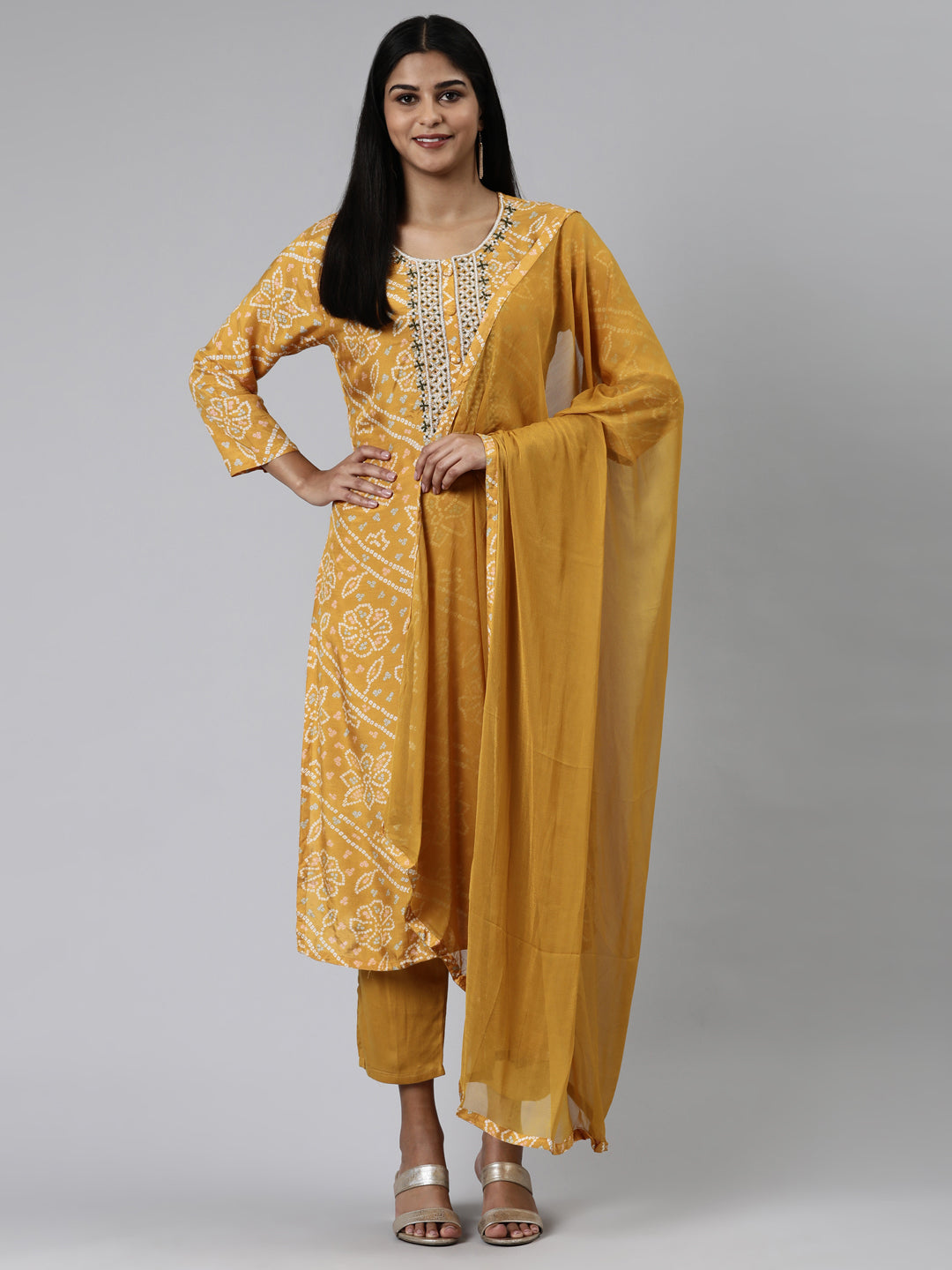 Neerus Yellow printed kurta set with trouser and dupatta - front view