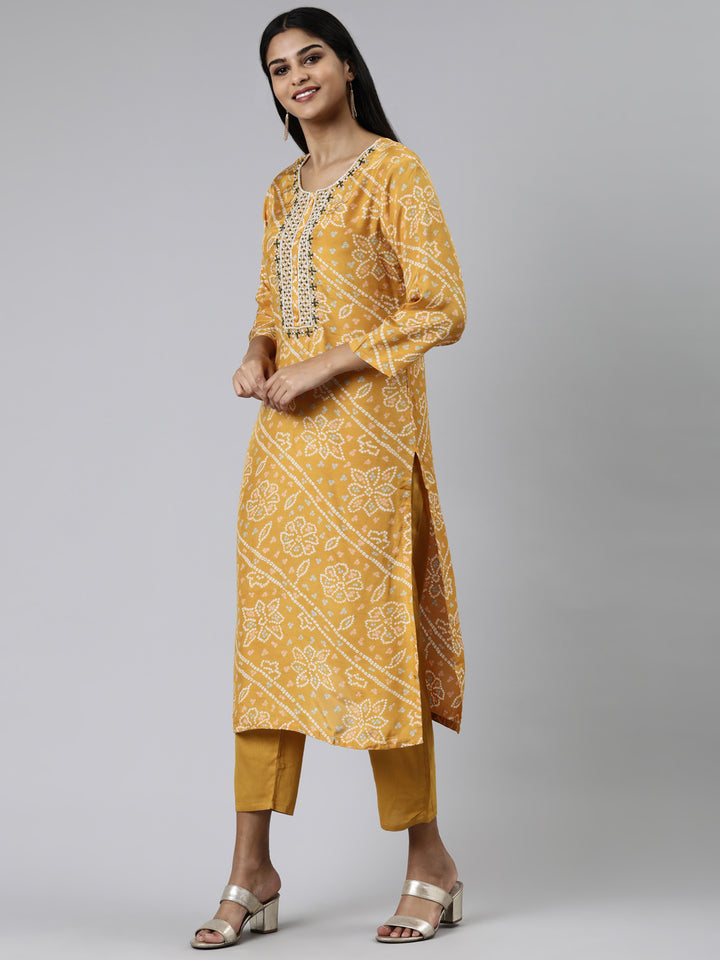 Neerus Yellow printed kurta set with trouser and dupatta - back view