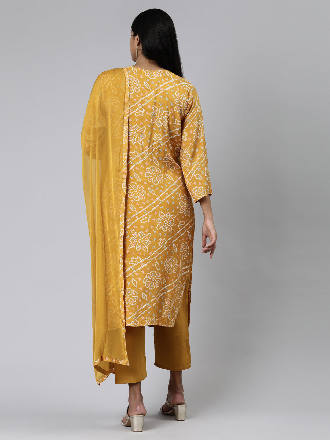 Neerus Yellow printed kurta set with trouser and dupatta - side view