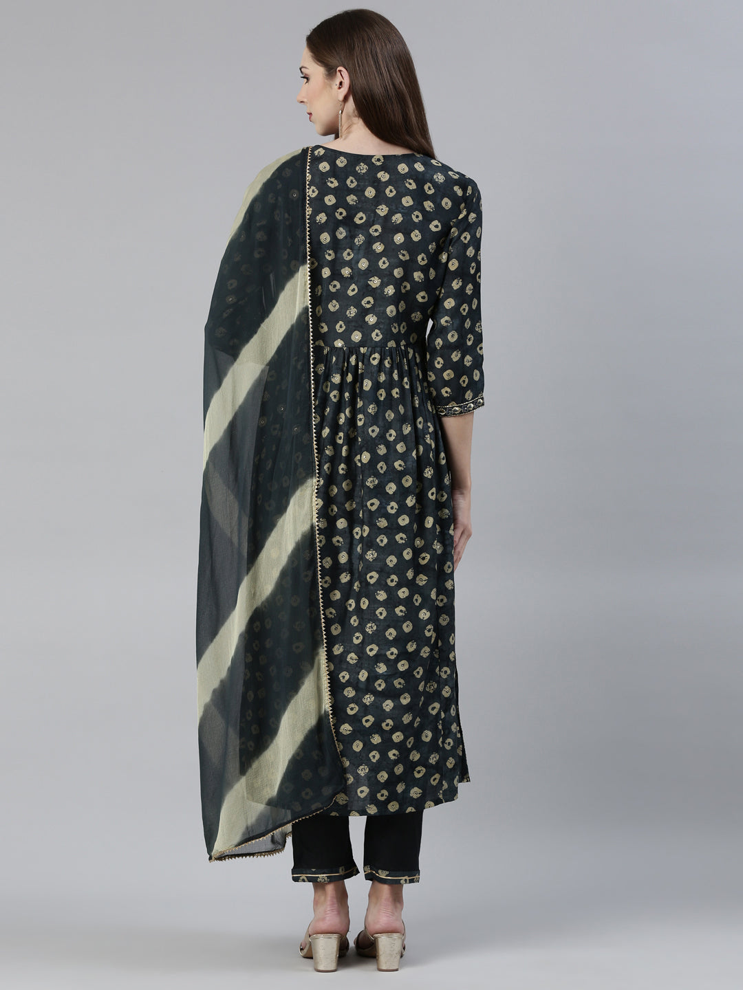 Neerus Green cotton printed kurta set with trouser and dupatta - side view