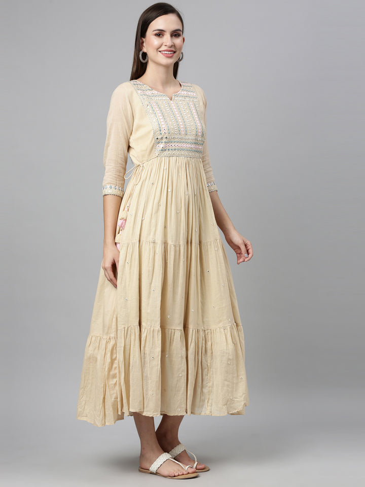 Neerus Beige cotton mirror work tiered kurti - front view