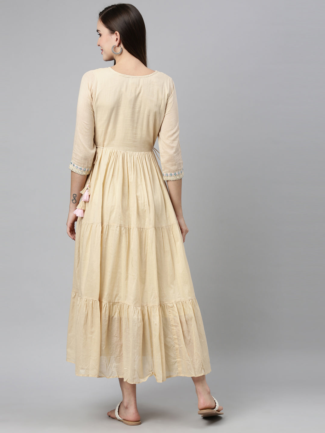 Neerus Beige cotton mirror work tiered kurti - back view