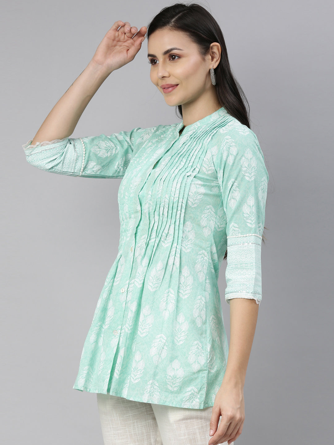 Neerus Green cotton printed A-line kurti with mandarin collar - side view