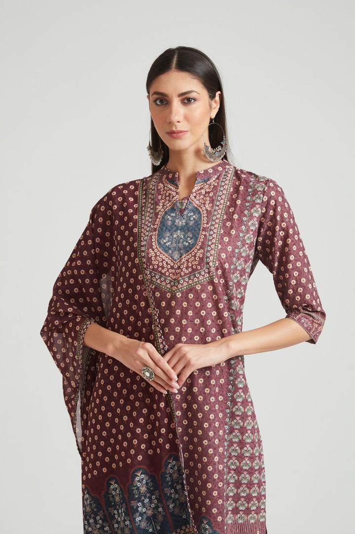 Neerus Wine Color Chiken Fabric Salwar Kameez