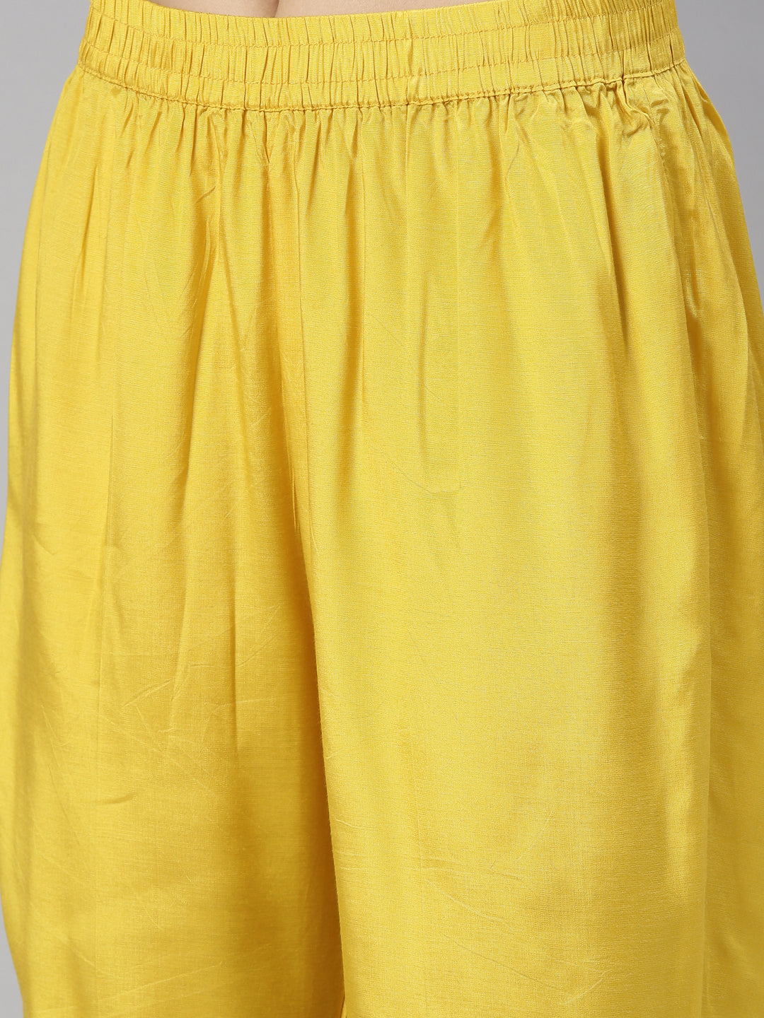 Neerus Yellow muslin solid kurta - back view