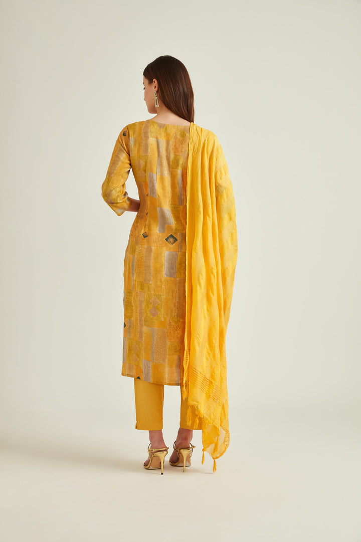 Neerus Yellow muslin mirror work kurta set - side view