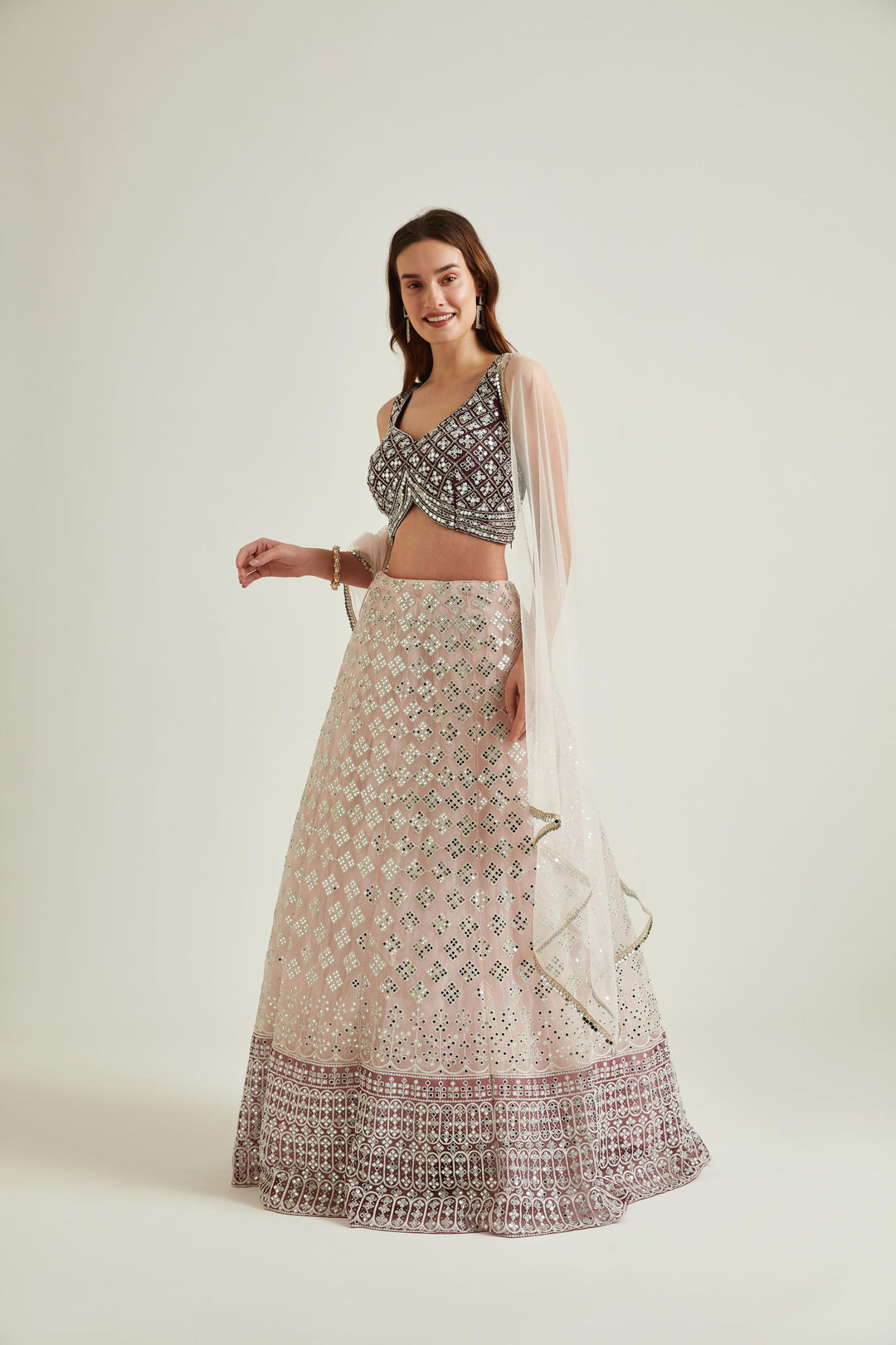 Neerus Pink net embellished lehenga choli set - front view