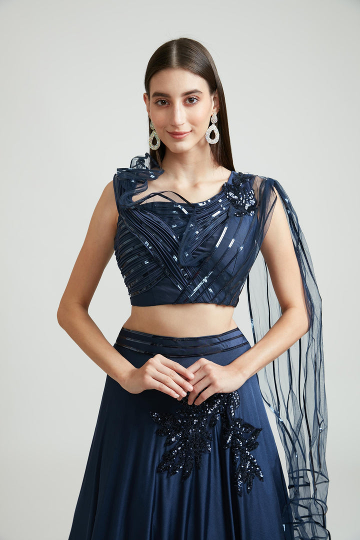 Neerus Blue polyester embellished lehenga choli set - back view