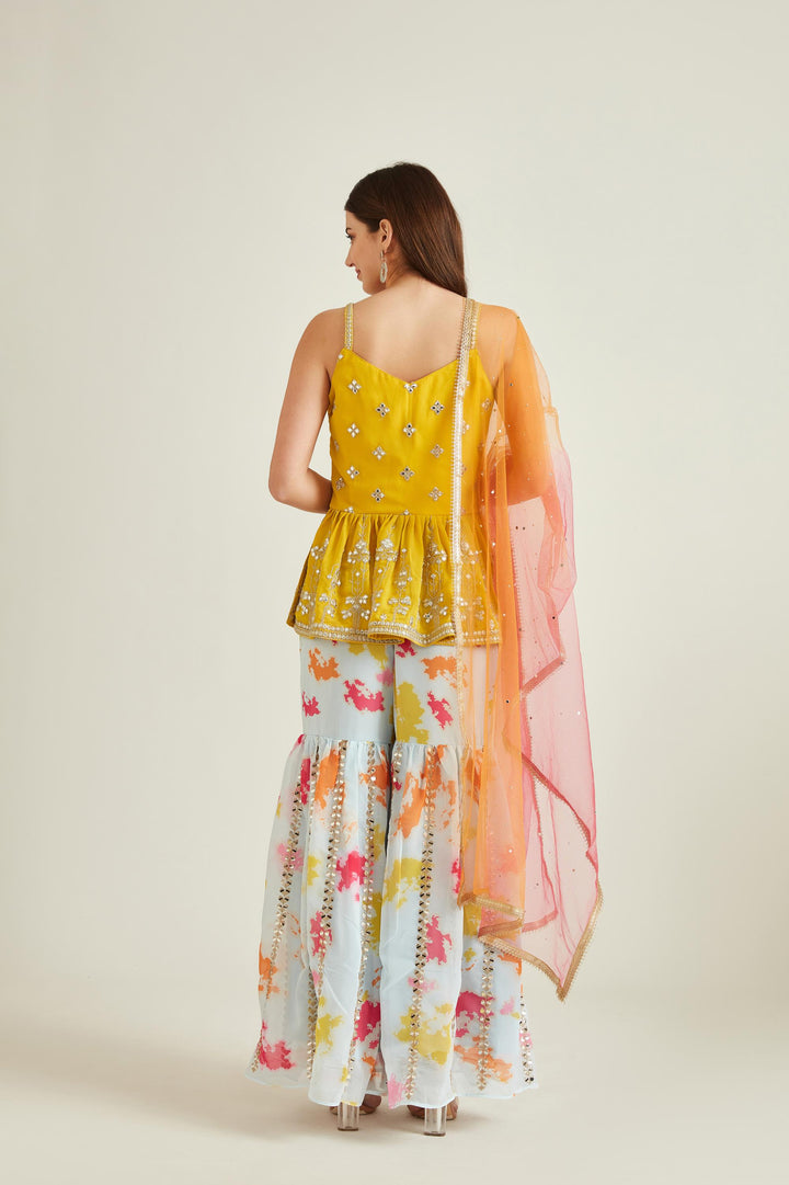 Neerus Yellow georgette mirror work kurta set - side view