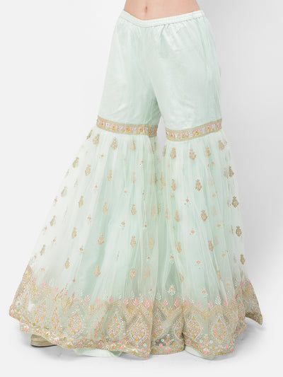 Neeru's pista color nett fabric salwar kameez