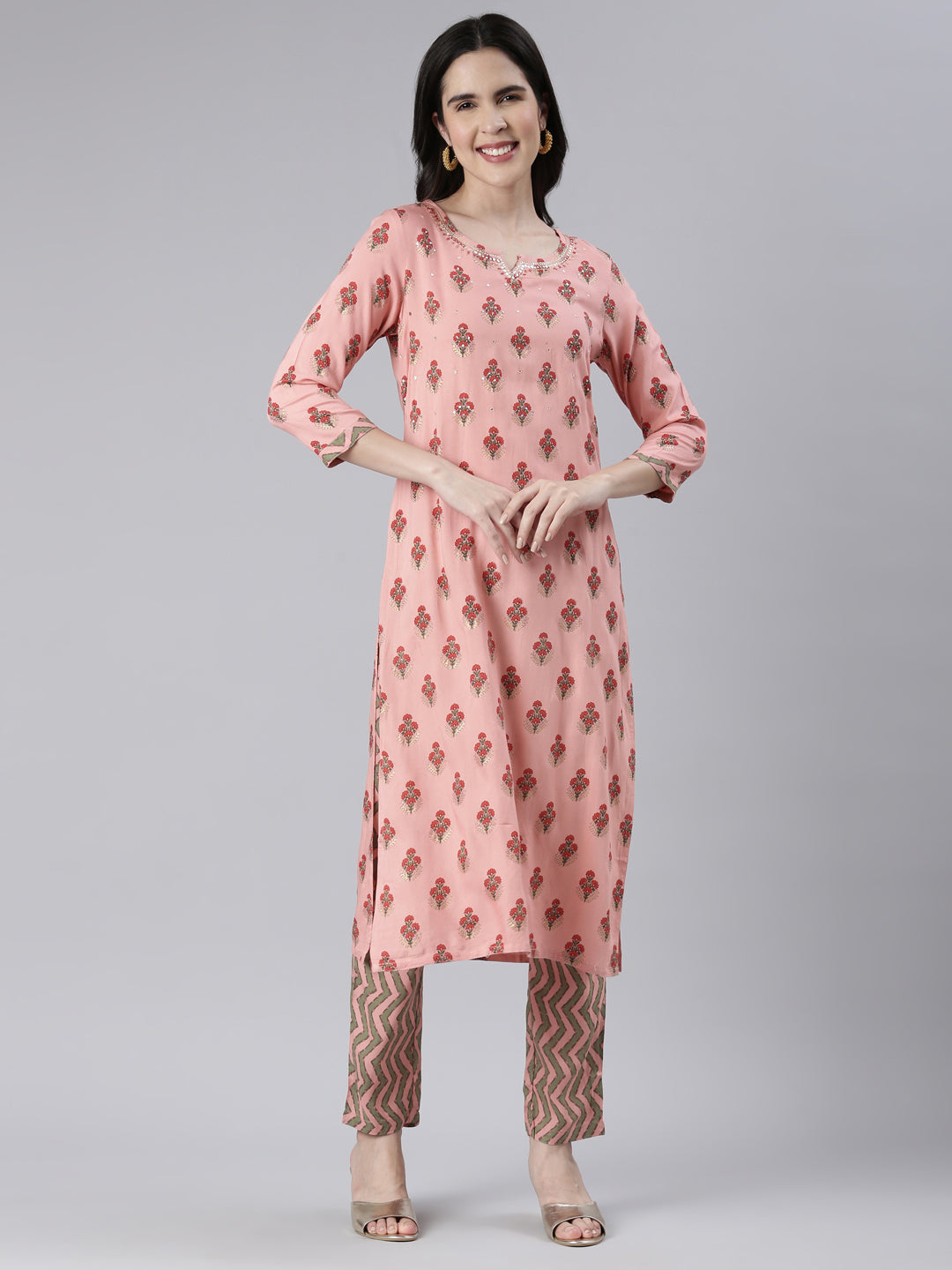 Neerus Pink rayon solid kurta set with trousers - front view