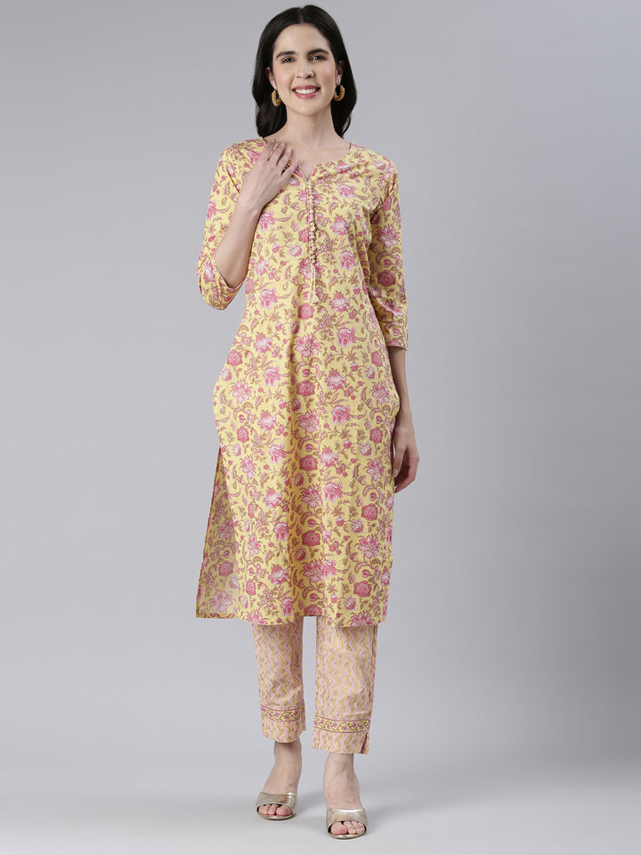 Neerus Yellow printed straight kurta set with trousers - front view