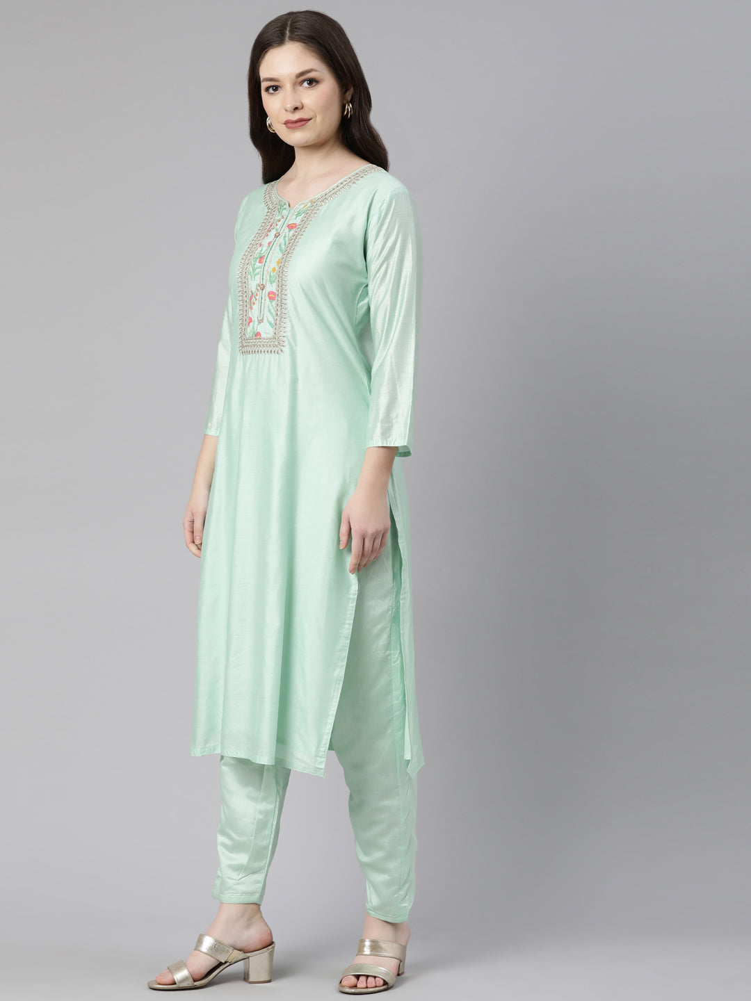 Neerus Green solid straight kurta set with trouser and dupatta - back view
