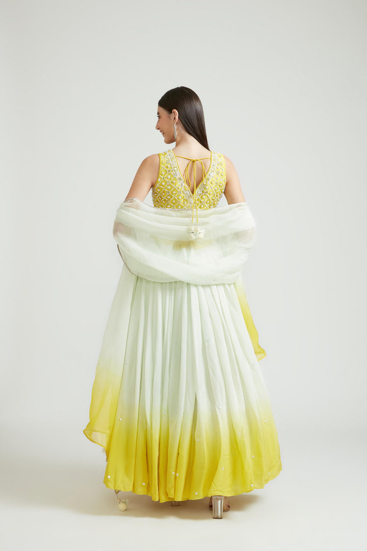 Neerus Yellow Chinon Embellished Lehenga Choli Set - side view