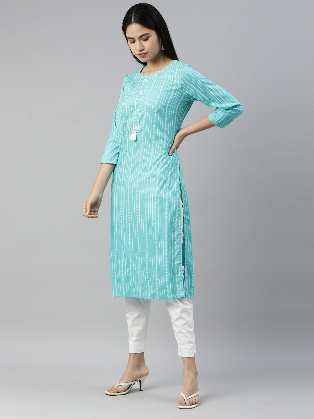 Neerus Green rayon solid kurta - back view