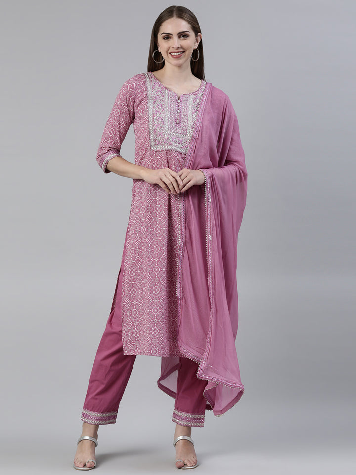 Neerus Purple cotton printed kurta set with trouser and dupatta - front view