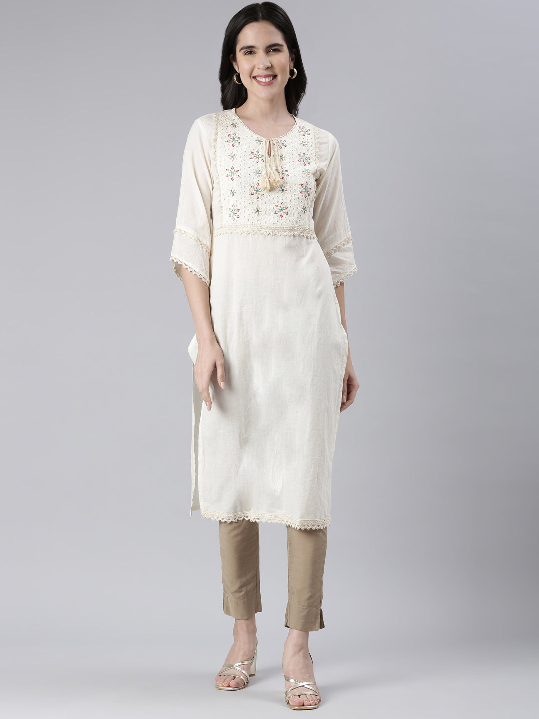 Neerus Beige cotton solid straight kurti - front view