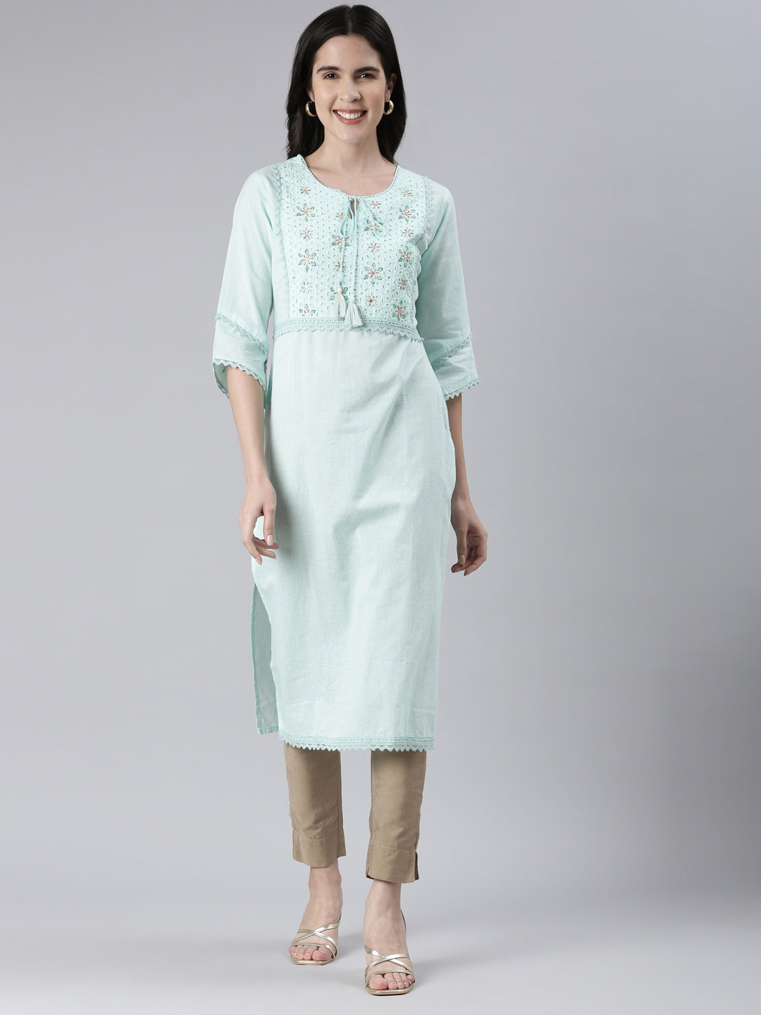 Neerus Green cotton solid straight kurta - front view