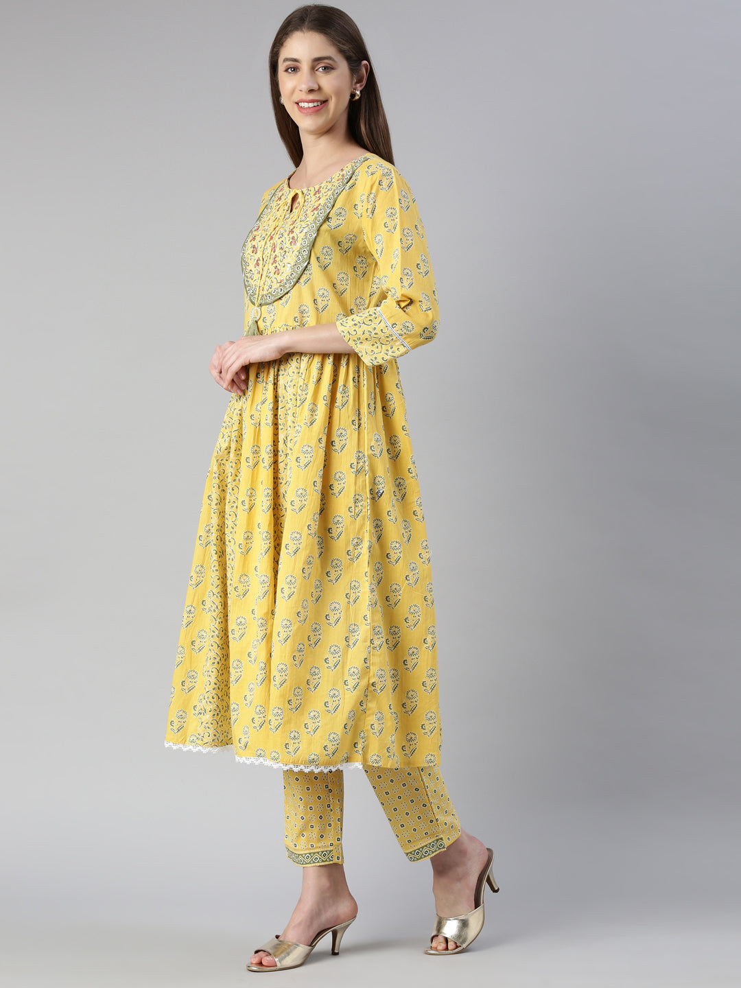 Neerus Yellow printed kurta set with trouser and dupatta - back view