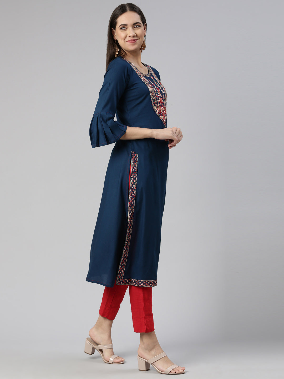 Neerus Green cotton printed straight kurti with yoke design - back view