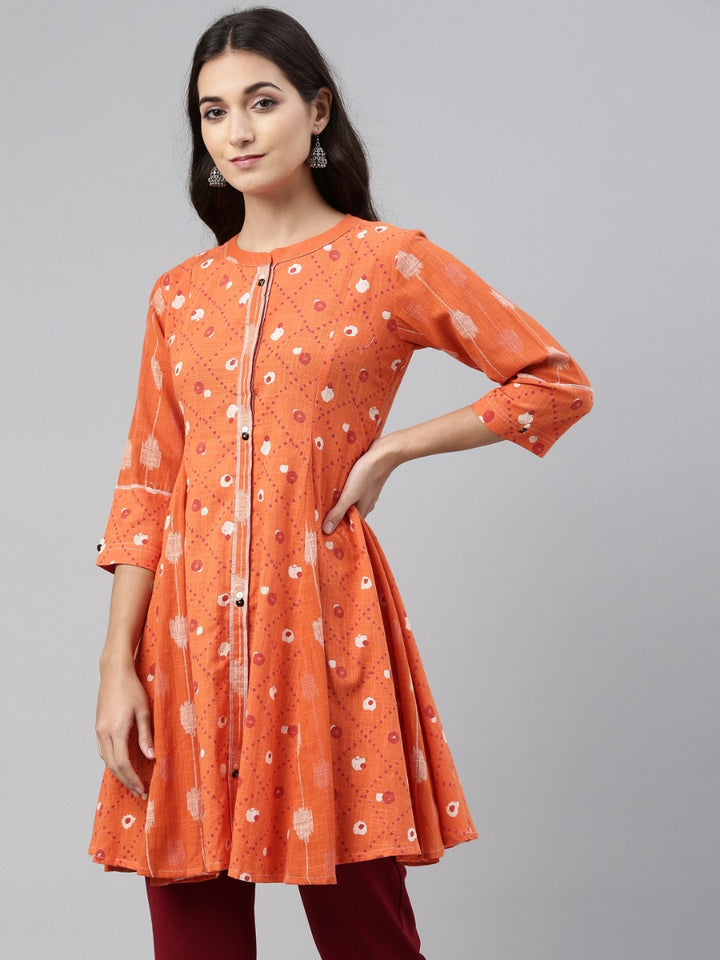Neerus Orange cotton straight kurti tunic - back view