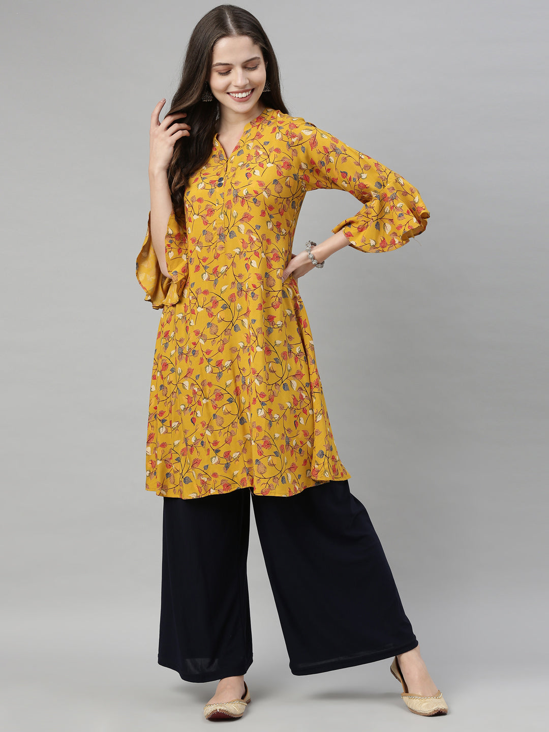Neerus Yellow printed A-Line kurta - front view
