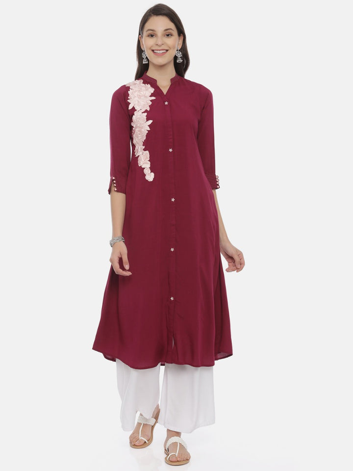 Neerus Maroon rayon embroidered A-line kurta - front view