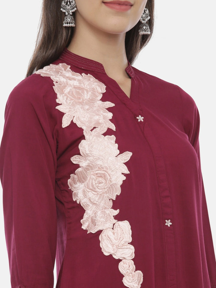 Neerus Maroon rayon embroidered A-line kurta - back view