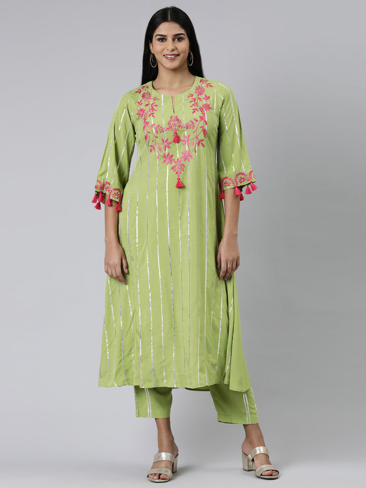 Neerus Green Regular Calf Length Solid Kurta Solid Trousers