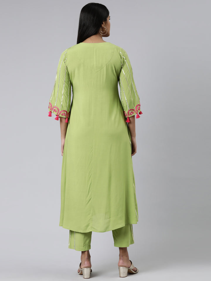 Neerus Green Regular Calf Length Solid Kurta Solid Trousers