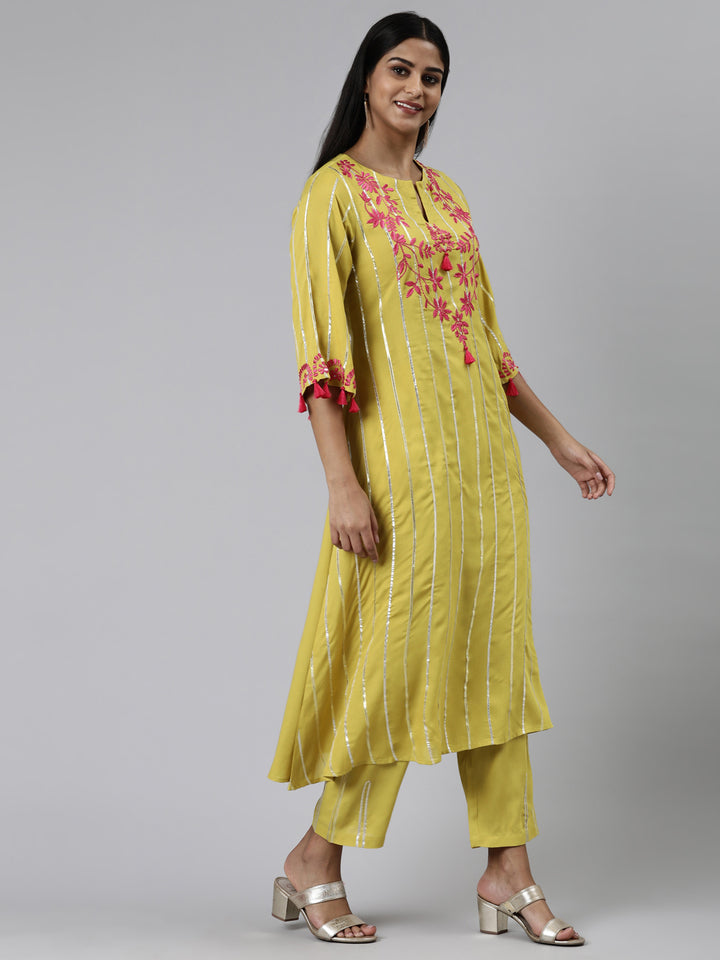 Neerus Green Regular Calf Length Embroidered Kurta Solid Trouser