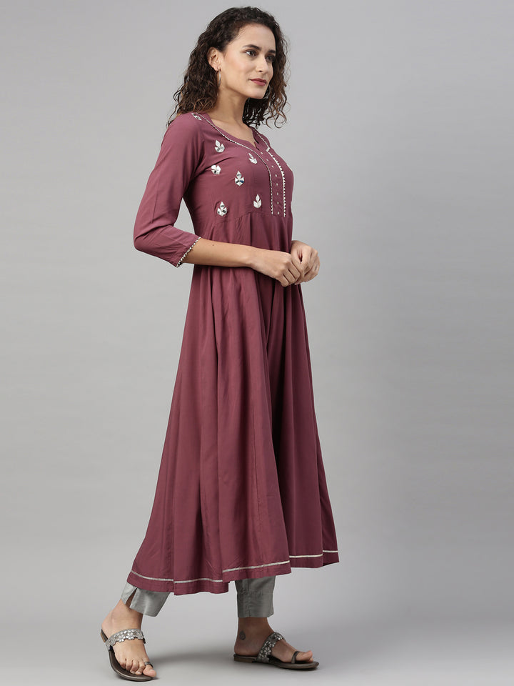 Neerus Maroon rayon mirror work kurti - front view