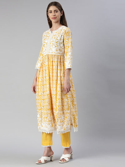 Neerus Women  Mustard Solid Calf Length Kurta And Trousers With Dupatta