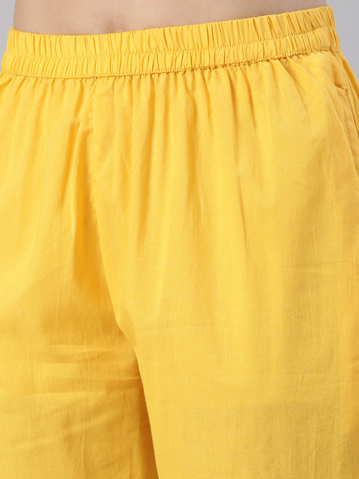 Neerus Women Mustard Solid Calf Length Kurta And Trousers With Dupatta