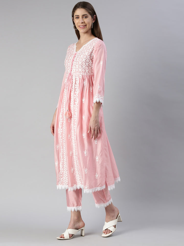 Neerus Pink solid Nyra cut kurta set with trouser and dupatta - back view