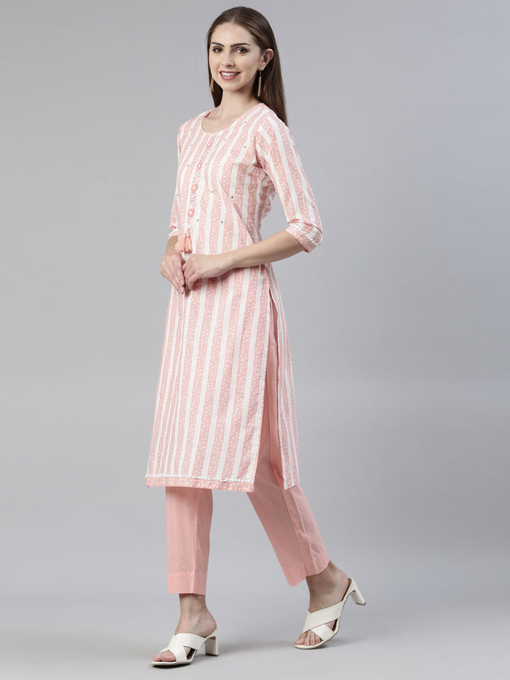 Neerus Orange solid straight kurta set with trouser and dupatta - back view